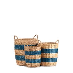 two blue and tan baskets with handles on each side, one has a stripe pattern