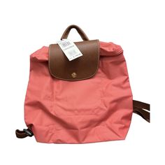 All Of My Listings Are Authentic Brand New With Tag. No Dusty Bag! A Timeless And Durable Nod To French Style, Longchamp' Nylon Backpack Stows Any Essentials For The Trs Chic Girl On The Go. Top Handle, Adjustable Backpack Straps; Front Flap With Snap And Zip Closure; Packable, Leather Trim; Size: 11.5"H X 10"W X 3.75"D, 2" Handle Drop; Foldable Backpack, Longchamp Bag, Longchamp Bags, Cell Phone Holster, Backpack Straps, Walker Boots, Garment Bags, Blush Makeup, D 2