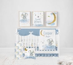 a baby crib bedding set with blue and white decor