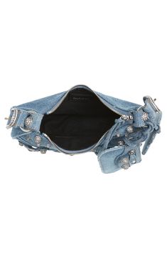 Balenciaga reimagines an '00s style with this hemispherical shoulder bag crafted from blue-wash denim and detailed with textured hardware. A tasseled zipper pull, heart-shaped mirror bag charm and zip pouch complete the look with signature flair. Top zip closure Adjustable shoulder strap Removable mirror and zip pouch Textile Made in Italy Designer Handbags Designer Denim Shoulder Bag With Branded Hardware, Mirror Bag, 00s Style, Denim Shoulder Bag, Shaped Mirror, Denim Shoulder Bags, Zip Pouch, Small Shoulder Bag, Blue Bags