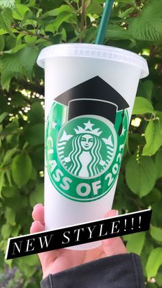 someone holding up a starbucks cup with the words new style on it and a green straw