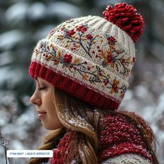 a woman wearing a red and white knitted hat with pom - pom