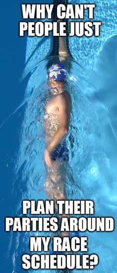 a young boy swimming in a pool with goggles on his head and no shirt