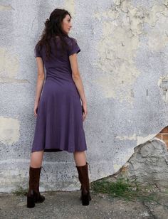 Style – The Slip style is a rounded neckline in the front and back. The top of this design, including the sleeves, is made with a stretchy fabric for an easy and comfortable fit. The bottom of the garment is made with your choice of knit fabric, creating a contrast in texture and tone from the top. The bottom of the garment is an open and flowy style. Perfect Pockets – Two deep, exterior pockets incorporated into the seams of the garment. Form and function combine beautifully to keep hands toast Cotton Stretch Dresses With Crew Neck, Stretch Cotton Dresses With Crew Neck, Stretch Cotton Crew Neck Dresses, Fitted Purple Midi Dress Casual Style, Purple Fitted Casual Midi Dress, Casual Fitted Purple Midi Dress, Stretch Cotton Midi Dress For Work, Fitted Cotton Modest Dress, Modest Fitted Cotton Dress