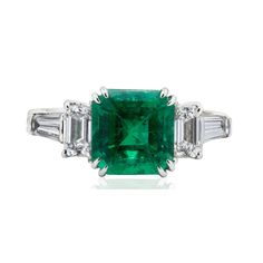 18k White gold ring with GIA certified (2185223254) 2.15 carat gem quality Colombian emerald certified as "Minor" enhancement. In addtion there are 2 emrald cut and 2 baguette cut diamonds weighing approximately 0.70 carats total. 4.12 grams Gia Certified Baguette-cut Emerald Platinum Ring, Gia Certified Baguette Cut Emerald Platinum Ring, Gia Certified Platinum Emerald Baguette Ring, Gia Certified Luxury Square Cut Emerald Ring, Luxury Gia Certified Square Cut Emerald Ring, Gia Certified Baguette Cut Emerald Ring, Gia Certified Square Cut Emerald Ring, Colombian Emerald Ring, Colombian Emeralds