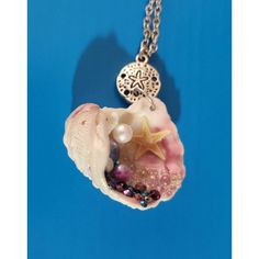 This Is A Ooak Handmade Sea Shell Pendant Filled With Faux Pearls, Real Ethically Harvested Star Fish, "Bubbles", And Pink, Grey And Purple Jewels That Look Like They Were Scooped From The Bottom Of The Ocean Floor!! This Includes A 20 Inch Stainless Steel Hypoallergenic Chain As Shown, And Sand Dollar Charm As Shown. A Beautiful Necklace Fit For A Mermaid Or Princess In Life Or Of Heart!! A Pendant That Looks Like It Came From The Sea Filled With It's Treasures And Great For A Gift For Any Occa Handmade Purple Beach Necklaces, Handmade Purple Necklaces For Beach, Elegant Purple Necklaces For Beach, Elegant Purple Necklace For The Beach, Elegant Purple Necklace For Beach, The Bottom Of The Ocean, Bottom Of The Ocean, Ocean Floor, Pearl Drop Necklace