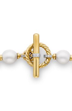 Cultured South Sea pearls bring lustrous shine to this link bracelet crafted of 18-karat gold with sparkling round-cut diamonds highlighting the toggle clasp. Total diamond weight: 0.59ct. Pearl size: 10–12mm 18k-gold/cultured pearl/diamond Made in Italy Linked Bracelet, Buy Pearls, Diamonds And Gold, Sea Pearls, South Sea Pearls, Pearl Diamond, Bracelet Crafts, Pearl Size, Toggle Clasp