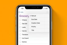 an iphone showing the grocery list on its screen