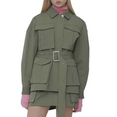 Rocket X Lunch Green Jacket. Drawstring And Belt. Khaki Cropped Jacket With Pockets For Work, Fitted Long Sleeve Utility Jacket With Multiple Pockets, Spring Military Utility Jacket For Workwear, Khaki Utility Cropped Jacket For Work, Green Outerwear With Belted Cuffs And Long Sleeves, Khaki Long Sleeve Cropped Jacket For Work, Green Long Sleeve Outerwear With Belted Cuffs, Spring Outerwear With Cargo Pockets And Long Sleeves, Spring Long Sleeve Outerwear With Cargo Pockets