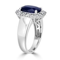 A perfect complement to your luxury look, this ring is crafted from 18k white gold. Set with a long cushion-cut Sapphire and sparkly round Diamonds, the ring adds luxury to your look and is perfect for big and small occasions. Product Information SKU J19780 Metal Type 18K Metal Color White Gold Ring Style Halo Primary Stone Gemstone Name Sapphire Gemstone Species Corundum No. Of Gemstones 1 Gemstone Shape Long Cushion Gemstone Color Royal Blue Gemstone Grade - Gemstone Clarity - Gemstone Weight Long Cushion, Luxury Look, White Gold Set, Ring Style, White Gold Ring, Blue Gemstones, Sapphire Gemstone, Gold Set, Metal Color