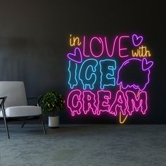 a neon sign that says i'm love with ice cream in front of a chair