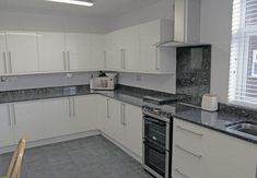 the kitchen is clean and ready for us to use in its new owner's home