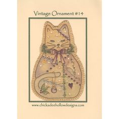 a card with an image of a cat on it's back and the words vintage ornament 1