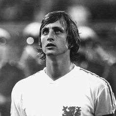 a man standing on top of a soccer field