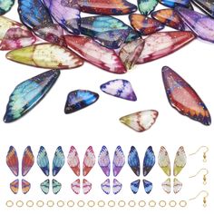 many different colored butterflies are arranged on a white background with gold trimmings and beading