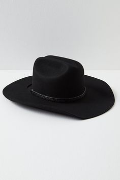 Taking cues from classic Western style, this vintage-inspired cowboy hat can instantly elevate any look. **Features:** Structured style, wool felt fabrication, dipped crown, wide upturned brim, rope accent **Why We | Ridge Felt Cowboy Hat by Lack of Color at Free People in Black, Size: L Western Wool Felt Hat For Rodeo, Western Wool Fedora For Rodeo, Country Style Wool Felt Hat For Rodeo, Country Style Wool Fedora For Rodeo, Felt Cowboy Hat, Felt Cowboy Hats, Lack Of Color, Cowboy Hat, Hat Shop