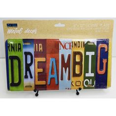 a set of three license plates with the word dream on them in different colors and letters