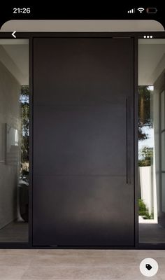 an iphone photo of a modern entry door