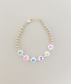 4mm gold-filled beads with assorted colored letter beads, this bracelet is great for a gift or a customized piece! The colored letter beads add a unique touch. I use the highest quality beads and is hand made to order for your special someone. It makes great personalized and custom gifts for Mom.  Mama Jewelry Mama gifts Custom adult jewelry Gold bracelets beaded bracelets  Hand made in the U.S.A. *see bottom of Etsy page for sizing details* Thanks for shopping small! *measure wrist for most acc Playful Personalized Gold Beaded Bracelets, Personalized Cute Gold Beaded Bracelets, Personalized Multicolor Name Bracelet For Everyday, Cute Name Bracelet With Round Beads For Everyday, Personalized Round Beads Name Bracelet For Birthday, Gold Beaded Bracelets With Name For Birthday, Personalized Name Bracelet With Round Beads For Birthday, Cute Everyday Name Bracelet With Round Beads, Gold Beaded Bracelet With Name For Birthday