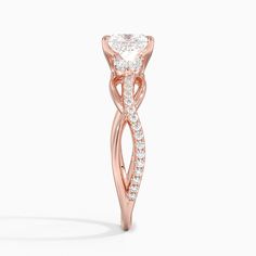 Lab Grown Garland Diamond Engagement Ring - 14K Rose Gold. Twisting vines of lustrous precious metal and diamonds sweep upwards towards two marquise-shaped diamond accents that rest on cathedral shoulders. The center gem is secured by claw prongs for a classic, elegant look (1/5 total carat weight). Elegant Rose Gold Diamond Ring With Lab Grown Diamond, Elegant Rose Gold Lab Grown Diamond Ring, Marquise Diamond Rose Gold Ring, Elegant 14k Rose Gold Wedding Jewelry With Diamond Accents, Marquise Rose Gold Diamond Ring With Center Stone, Luxury Marquise Cut Rose Gold Wedding Ring, Luxury Marquise Cut Diamond Ring In Rose Gold, Rose Gold Marquise Diamond Ring With Center Stone, Rose Gold Marquise Diamond Ring With Accents