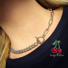 Super trendy chunky half paperclip chain half curb chain choker! This choker is 100% stainless steel and will not tarnish. Choker shown in photographs measures 14.5 inches but is available in other sizes. 💕You will receive this necklace gift wrapped ready to give as a gift to someone special or as a special treat for yourself! 💕 Matching bracelet also available here: https://www.etsy.com/uk/listing/944185131/chunky-chain-bracelet-paperclip-chain?ref=shop_home_active_1&frs=1 Trendy Silver Chain Jewelry With Oval Link, Trendy Oval Link Silver Chain Jewelry, Trendy Stainless Steel Link Chain Necklace, Trendy Toggle Necklace With Chunky Chain Link, Trendy Chain Necklace With Lobster Clasp, Metal Choker Toggle Necklace For Everyday, Trendy Link Toggle Necklace With Adjustable Chain, Everyday Metal Toggle Necklace Choker, Trendy Toggle Link Necklace With Adjustable Chain