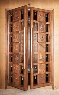 a wooden room divider with many doors