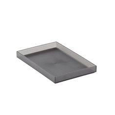 a gray plastic tray with holes in the middle and bottom, on a white background