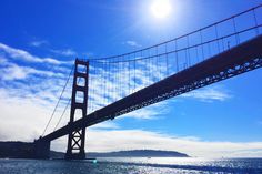 the golden gate bridge in san francisco, california on a sunny day with blue skies