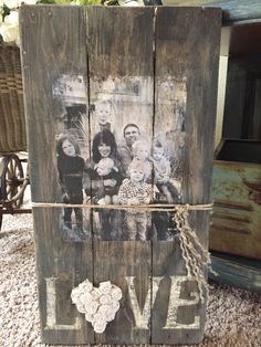 an old wooden box with some pictures on it