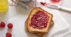 two pieces of toast with jam on them