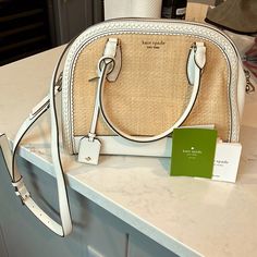 Kate Spade White And Natural Bag. Used Two Or Three Times. No Marks, Stains, Etc. Inside Is Still Brand New Also. Kate Spade Beige Shoulder Bag With Handles, Kate Spade Cream Satchel Bag, Beige Kate Spade Shoulder Bag With Handles, Chic White Kate Spade Shoulder Bag, Chic White Kate Spade Bag, Kate Spade Cream Bag With Adjustable Strap, White Kate Spade Bag With Detachable Strap, White Kate Spade Bag With Adjustable Strap, White Satchel For Spring Errands