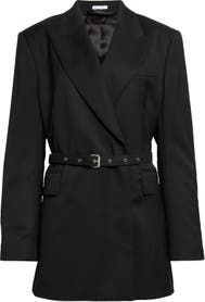 a women's black coat with a belted waist and lapel closures