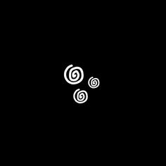 an abstract black and white logo with spirals in the center on a dark background