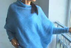 "Light jeans blue soft mohair cardigan, mohair silk poncho, blue soft mohair pullover, light blue mohair shawl, jeans blue mohair sweater So comfy, fuss free and great for layering. Balance the dramatic draping with leggings or your favourite skinny jeans. Go for a casual, lived in feel or dress it up for a dramatic evening look, depending on your mood. Can be worn open or belted. Will work well for maternity wear as well. Light weight jersey knit. Content + Care - 75% mohair, 25 % silk - Hand w Winter Mohair Sweater With Soft Knit, One Size Cozy Mohair Cardigan, Blue Mohair Knitted Sweater, Soft Mohair Long Sleeve Cardigan, Cozy Blue Mohair Sweater, Blue Hand-knitted Mohair Sweater, Wedding Sweater, Light Jeans, Mohair Cardigan