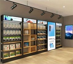 a display case in a retail store filled with items and electronics on wooden flooring