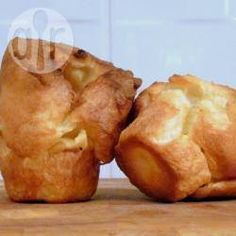 two pastries sitting on top of a wooden table