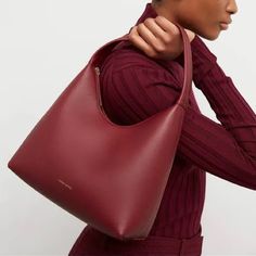 Mansur Gavriel Soft Candy Bag In Burgundy The Brand's Famed Candy Bag Has Been Softened Up (Think Ice Cream And Frosting) In Textured, Soft Calfskin Leather, Yet Remains The Sweet Style It Always Was. 10.5"W X 7"H X 4.5"D Top Zip Closure Shoulder Strap Interior Wall And Pocket Suede Lining Leather Made In Italy Retail $545 New W/Tag; Some Pressure Marks From Storage. Red Top Handle Shoulder Bag For Fall, Red Top Handle Bag For Fall, Red Office Bag For Fall, Red Bags For Fall Errands, Red Bag With Detachable Handle For Fall, Fall Red Bag With Detachable Handle, Modern Burgundy Shoulder Bag With Soft Leather, Modern Burgundy Bag With Removable Pouch, Classic Red Bags For Fall