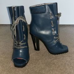 Navy Faux Leather Blue Boot With Silver Detailing...Zippered And Lace Front...Open Toe...Rugged Sole...Heel Approx. 4-5 Inches...New, Never Worn Blue High Heel Synthetic Boots, Blue Leather Heels For Winter, Blue Leather Lace-up Heels, Open Toe Boots, Blue Boots, Knee High Leather Boots, Lace Up Boots, Front Open, Lace Front