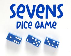 three blue dices sitting next to the words sevens dice game