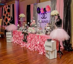 a chanel themed party with pink and black decorations