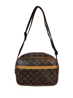 Louis Vuitton "Reporter PM" shoulder bag is compact yet has excellent storage capacity. It is lightweight and can be used as a shoulder tote, for daily use, travel or a business bag. 2 main compartments with zipper closing, one slip in pocket on the front and one slip in pocket inside. Overall a good condition, slightly out of shape. Shows patina and stain on the leather. Corners shows some rubbing. Hardware has some metal peeling and minor scratches. Interior shows sign of use with some minor d Pm Monogram, Gold Ounce, North Korean, Out Of Shape, Business Bag, Shoulder Tote, A Business, Louis Vuitton Bag, Inside Pocket