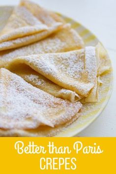 some crepes on a plate with powdered sugar and the words, better than paris crepes