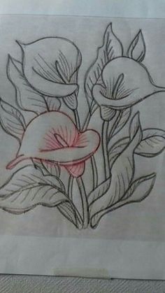 a drawing of some flowers on a piece of paper