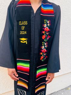 "Beautiful and unique design  Mexican United States stole   2024 stole All SALES ARE FINAL. We DO NOT offer any refunds, remakes or exchanges. Thank you for understanding this policy before placing your order.   Limited edition  Estola de graduación  Adult  Stole graduacion  New design  50% cotton 50% polyester  Hermosa estola para graduación  Bandera de mexico y Estados Unidos Graduation Stole background with multicolored stripes.  These are authentic Mexican serapes woven from acrylic fibers. Graduation Mexican Stoles, Mexican Graduation Sash, Multicolor Embroidered Graduation Stole, Embroidered Multicolor Graduation Stole, Sublimation Graduation Stole, Traditional Embroidered Graduation Stole, Embroidered Black Graduation Stole, Mexican Sarape, Mexican Serapes