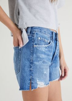 The CAI SHORT - 4" is a high-rise jean short. It sits at the natural waist and is a cutoff short short. In a worn in and lightly distressed twist on classic blue. 100% COTTON Front rise: 10 1/2" | Leg Opening: 14 1/2” | Inseam: 4" Fits true to size Model is wearing a size 26 Women Clothing Boutique, Cut Off Shorts, Clothing Boutique, High Rise Jeans, Classic Blue, Cut Off