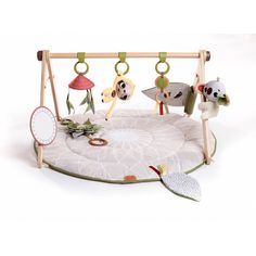 a baby's play gym with animals on it