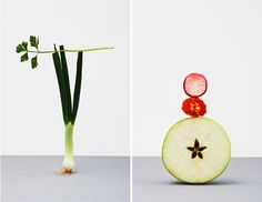 an apple cut in half sitting on top of a piece of celery and radishes