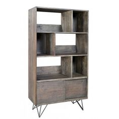 an open bookcase with three drawers and two small shelves on one side, in grey wood