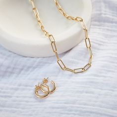 The Sasha Hoop Earrings are a timeless gold hoop, perfect for everyday wear. Crafted with hollow 14k yellow gold, these hoops add personality without any of the weight. Necklace Family, Add Personality, Gold Hoop, Chain Lengths, Chain Necklace, Everyday Wear, Hoop Earrings, Yellow Gold, Rose Gold