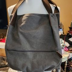 A Large Bag Could Be Used As An Overnight Bag. Large Zipper Pocket In Front And Two Zipper Pockets Inside And To Places For Sunglasses And Cellphones. Also Has A Strap To Use As A Shoulder Bag. Vegan Handbags, Gucci Monogram, Fringe Bags, Brown Shoulder Bag, Leather Shoulder Handbags, Leather Hobo Bag, Overnight Bag, Leather Tassel, Large Bag